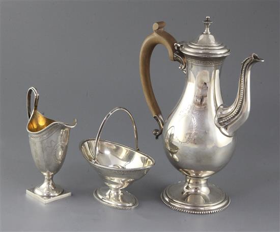 An early 1970s 18th century style silver three piece coffee set by C.J. Vander Ltd, gross 38.75 oz.